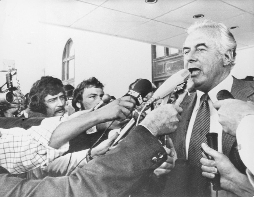 Gough Whitlam addresses reporters outside the Parliament building in Canberra after his dismissal by Australia's Governor-General, 11th November 1975.
