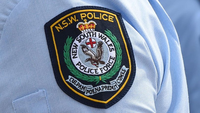 A police officer has been jailed for robbing a sex offender in an outback town.