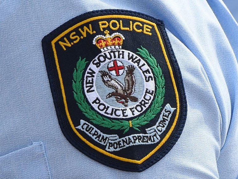 A police officer has been jailed for robbing a sex offender in an outback town. 