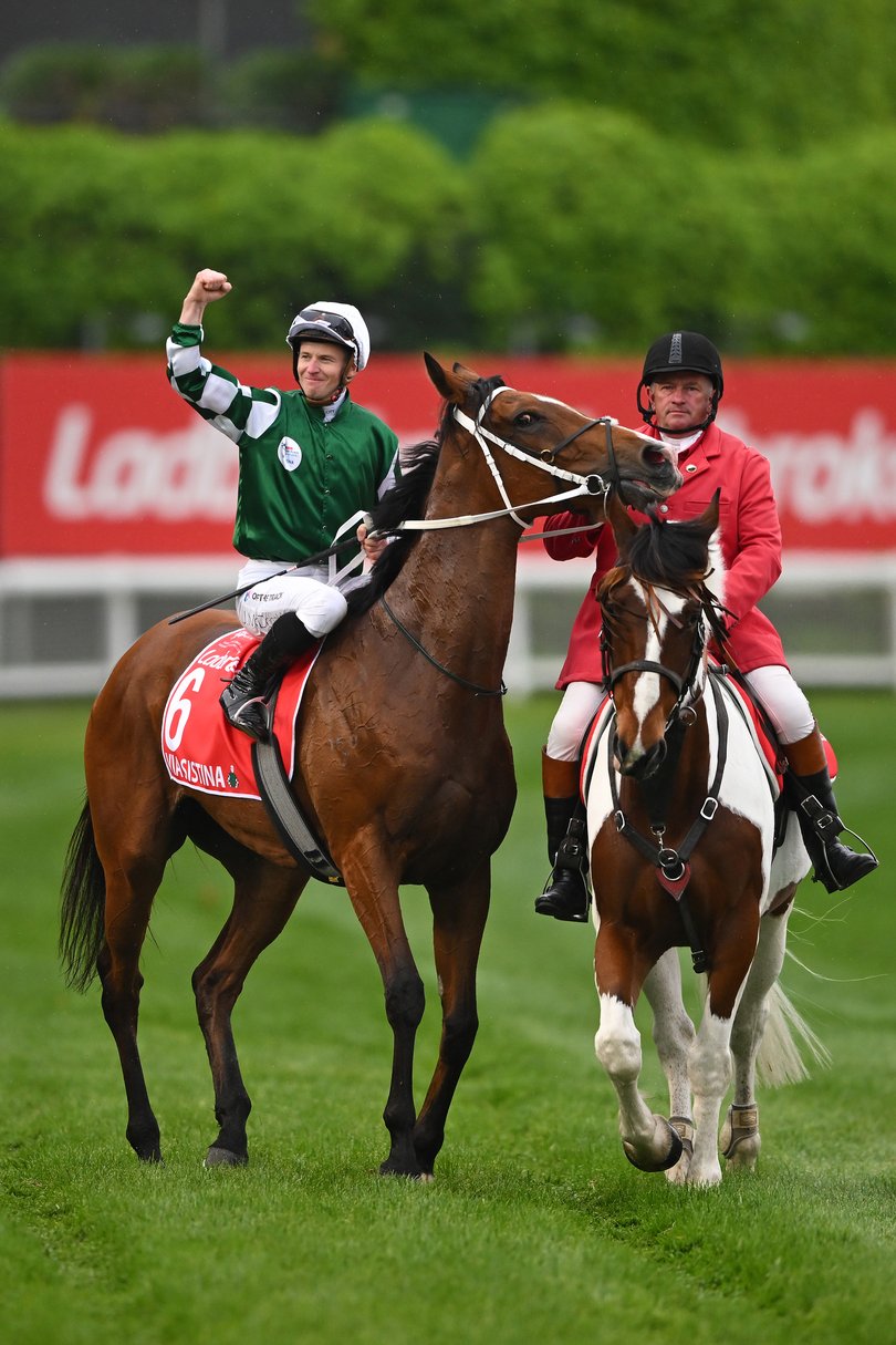 Jockey James McDonald (left) reacts after riding Via Sistina to Victory to win the Cox Plate during the Cox Plate at Moonee Valley Racecourse in Melbourne, Saturday, October 25, 2025. (AAP Image/James Ross) NO ARCHIVING, EDITORIAL USE ONLY