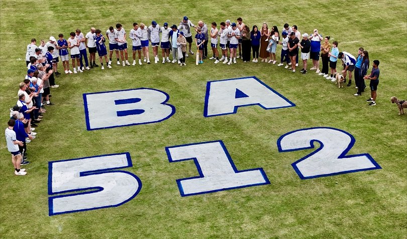 Players, coaches and supporters gathered around a tribute to Ben on the ground.