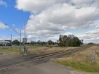 A baby girl has died after being struck by a freight train in northern inland New South Wales.