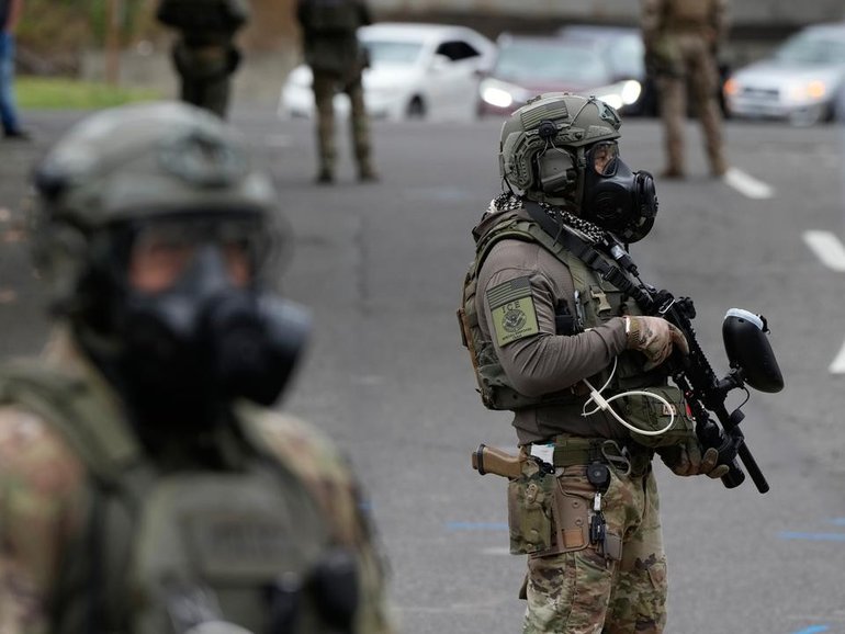 Protests against an immigration enforcement agency have been met with a strong federal response. (AP PHOTO)