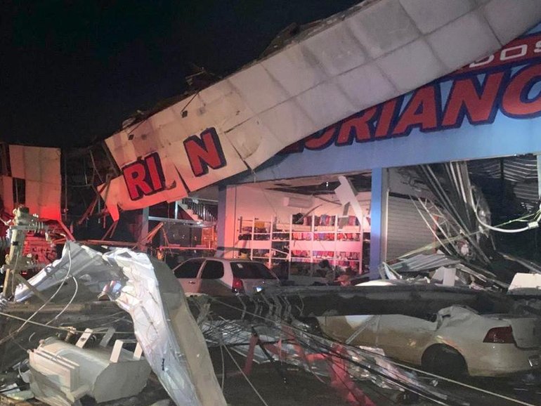 A deadly tornado that hit Rio Bonito do Iguacu left buildings with collapsed roofs. (EPA PHOTO)