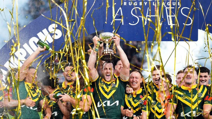 Captain Isaah Yeo lifts the trophy aloft after Australia completed a 3-0 Ashes whitewash at Leeds. 