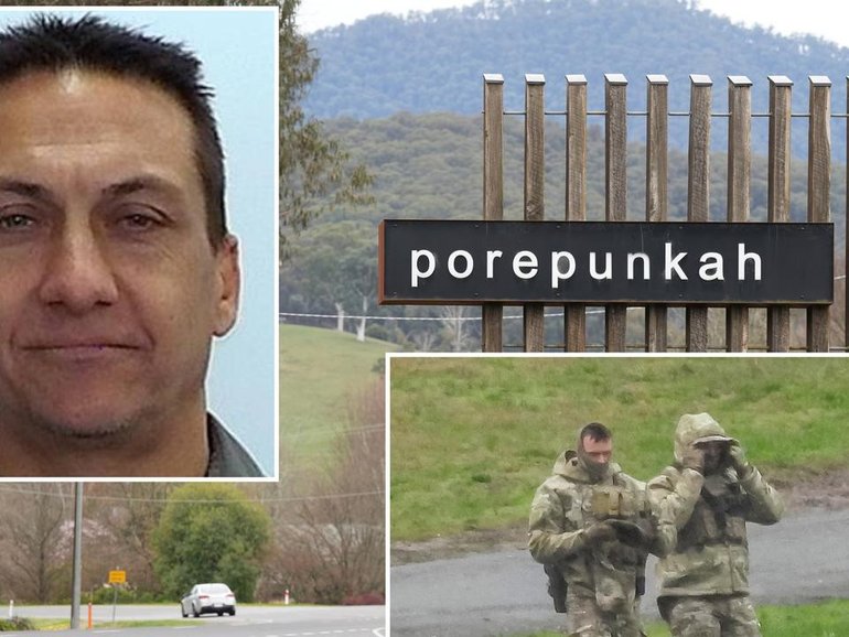 It's emerged that a single gunshot was heard after two police officers were killed at Porepunkah. (Simon Dallinger/AAP PHOTOS)