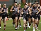 Essendon players have hit the training track, without skipper Zach Merrett. (Con Chronis/AAP PHOTOS)