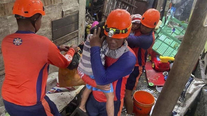 Philippine coast guard rescuers have helped move residents to safer grounds as a typhoon approached. 