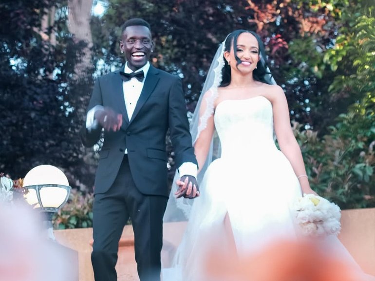 Australian Olympian Peter Bol has married Mahtut Yaynu, his long-time partner and the mother of their daughter.