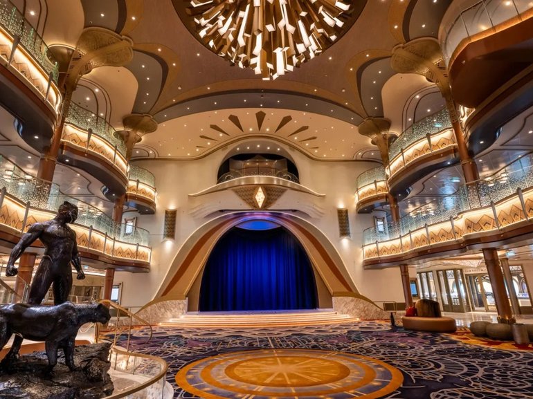 The Grand Hall of the Disney Destiny features an homage to Marvel’s ‘Black Panther,’ including a statue of the hero.