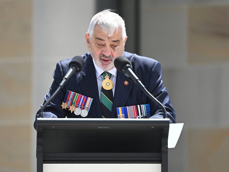 Retiring RSL President Greg Melick speaks during a Remembrance Day service at the Australian War Memorial, in Canberra.