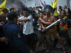 Protesters clash with security forces in an attempt to storm the COP30 headquarters in Belem, Brazil.