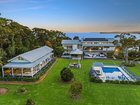 John Singleton has re-listed his luxury estate in Killcare Heights on the Central Coast.