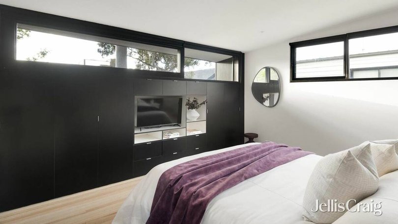 The bedrooms have built-in cabinetry.