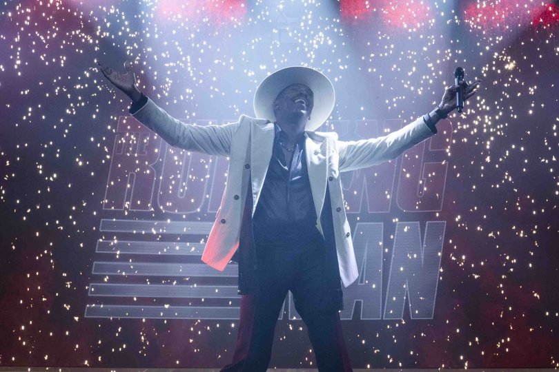 Colman Domingo as Bobby Thompson, host of a survival show where contestants are hunted. MUST CREDIT: Ross Ferguson/Paramount Pictures