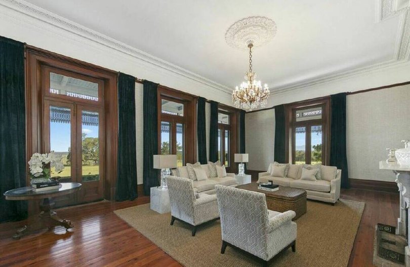 The grand residence spans 45 rooms, including multiple formal and informal living areas.