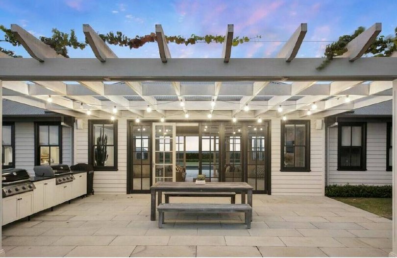 The outdoor kitchen at the pool house.