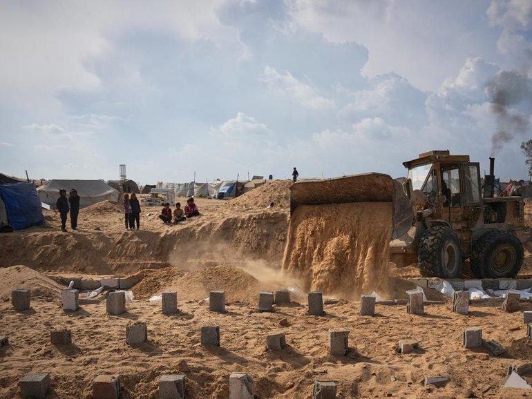 The bodies of 27 unidentified Palestinians returned from Israel have been buried in Deir al-Balah.