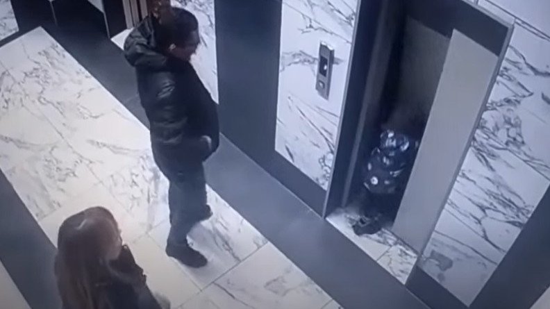 The horrifying moment the toddler fell through the lift well opening.