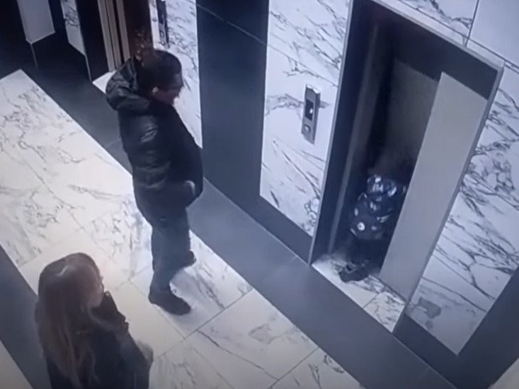 The horrifying moment the toddler fell through the lift well opening.