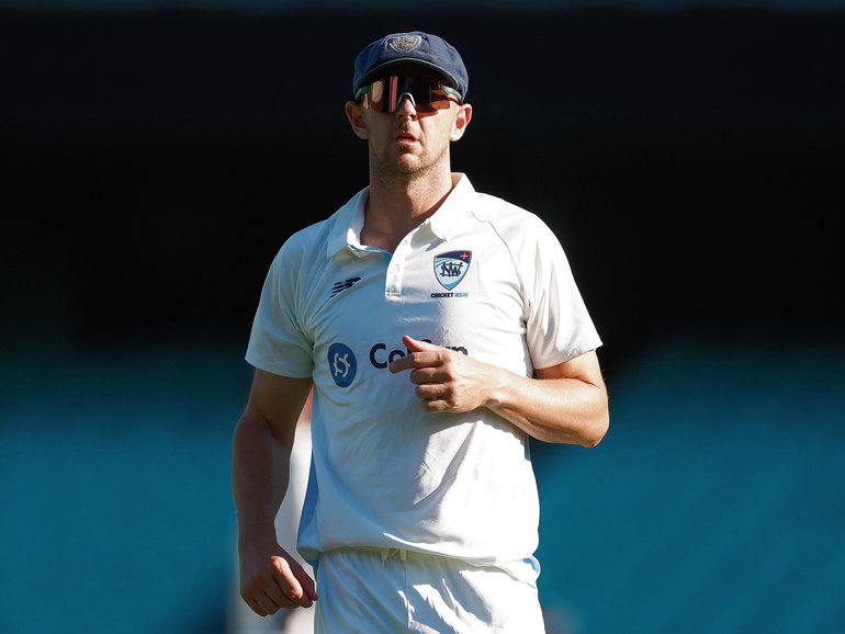 SYDNEY, AUSTRALIA - NOVEMBER 10: Josh Hazlewood of the Blues takes his place in the field during day one of the Sheffield Shield  match between New South Wales and Victoria at Sydney Cricket Ground, on November 10, 2025, in Sydney, Australia. (Photo by Darrian Traynor/Getty Images)