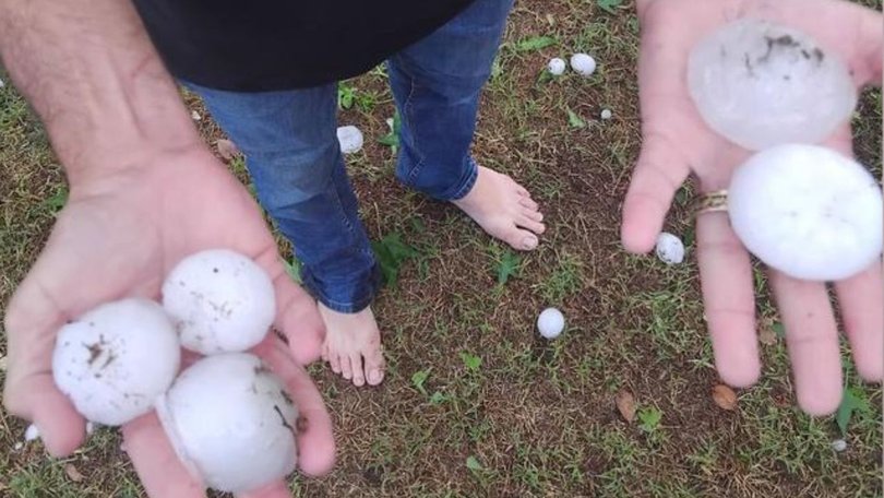 Large hailstones and heavy rain are hammering a large swathe of Australia’s east coast.