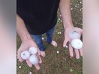 Large hailstones and heavy rain are hammering a large swathe of Australia's east coast. 