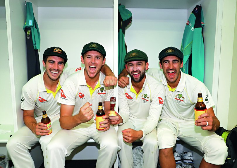 PERTH, AUSTRALIA - DECEMBER 18: Pat Cummins, Josh Hazlewood, Nathan Lyon and Mitchell Starc of Australia celebrate in the changerooms after Australia regained the Ashes during day five of the Third Test match during the 2017/18 Ashes Series between Australia and England at WACA on December 18, 2017 in Perth, Australia. (Photo by Ryan Pierse/Getty Images)