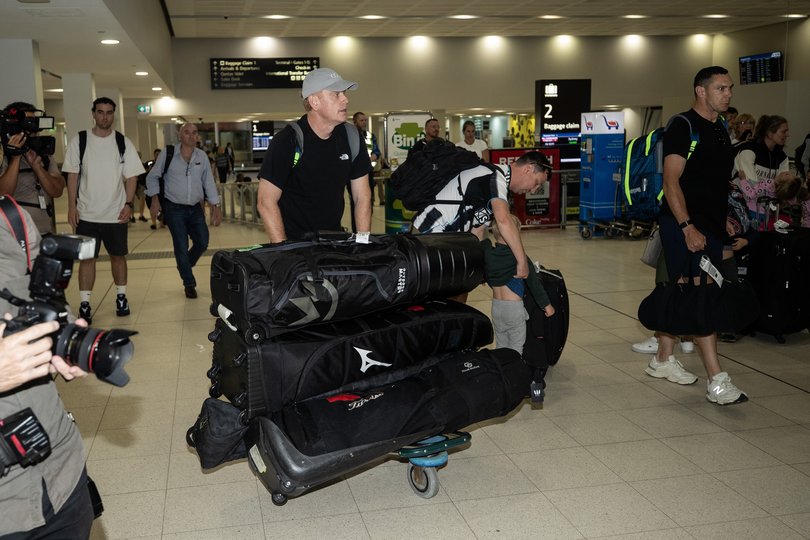 Andrew McDonald took responsibility for the golf bags.