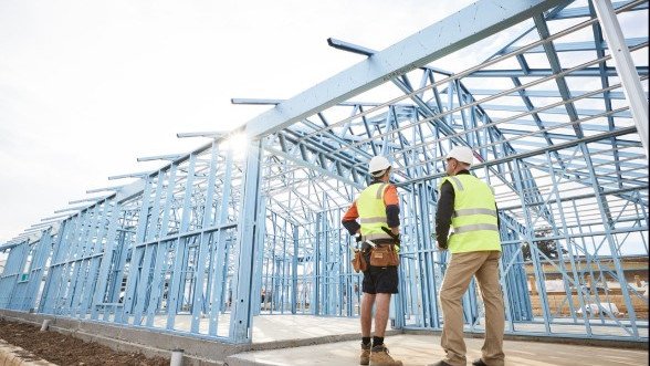 Young worker killed after beam comes crashing down.