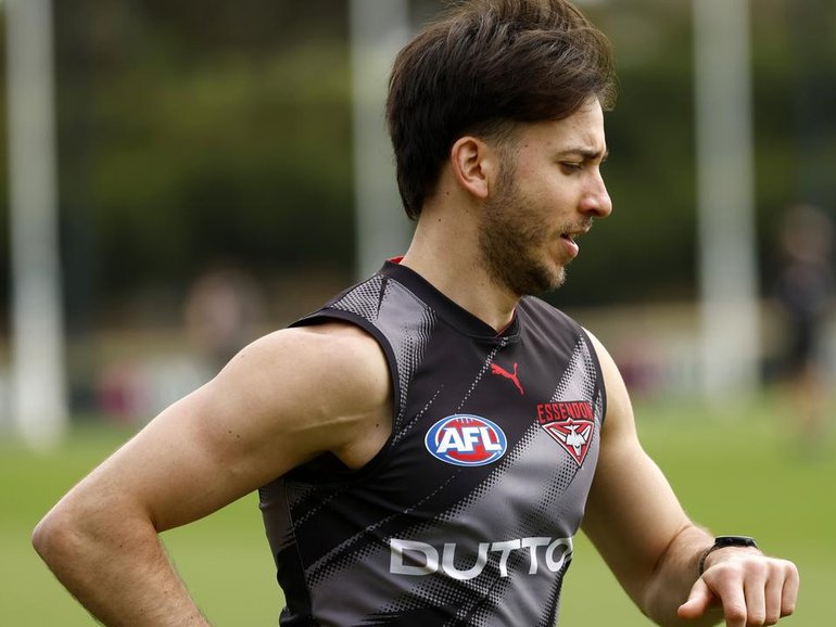 A pre-season training mishap has left Essendon's Nic Martin facing another knee reconstruction. (Con Chronis/AAP PHOTOS)