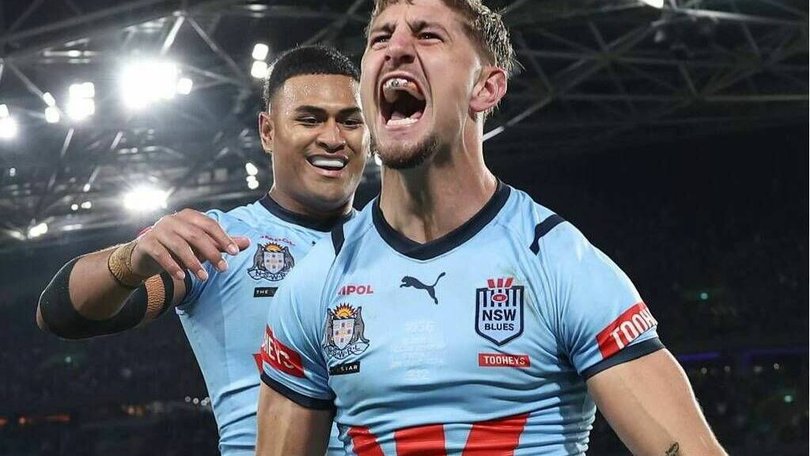 Lomax of the Blues celebrates scoring a try - and perhaps also his impressive property portfolio - during game one of the 2024 Men's State of Origin series. Matt King/Getty Images