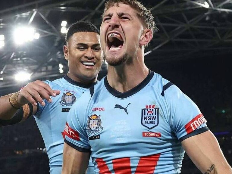 Lomax of the Blues celebrates scoring a try - and perhaps also his impressive property portfolio - during game one of the 2024 Men's State of Origin series. Matt King/Getty Images