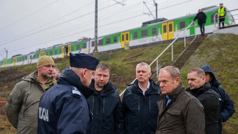 Poland Prime Minister Donald Tusk and Polish Interior Minister Marcin Kierwinski inspect the damaged railway tracks on the Warsaw-Lublin route in Poland.