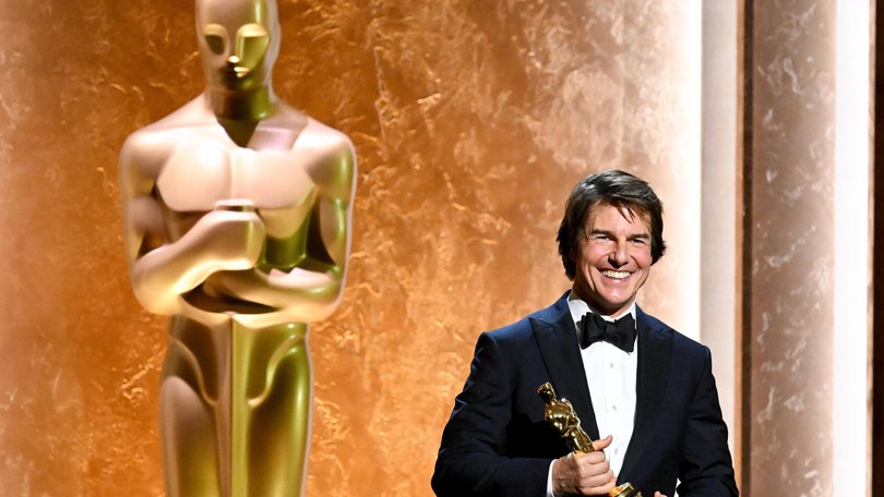 Tom Cruise holds up his honorary Oscar at The 16th Governors Awards held at The Ray Dolby Ballroom at Ovation Hollywood.