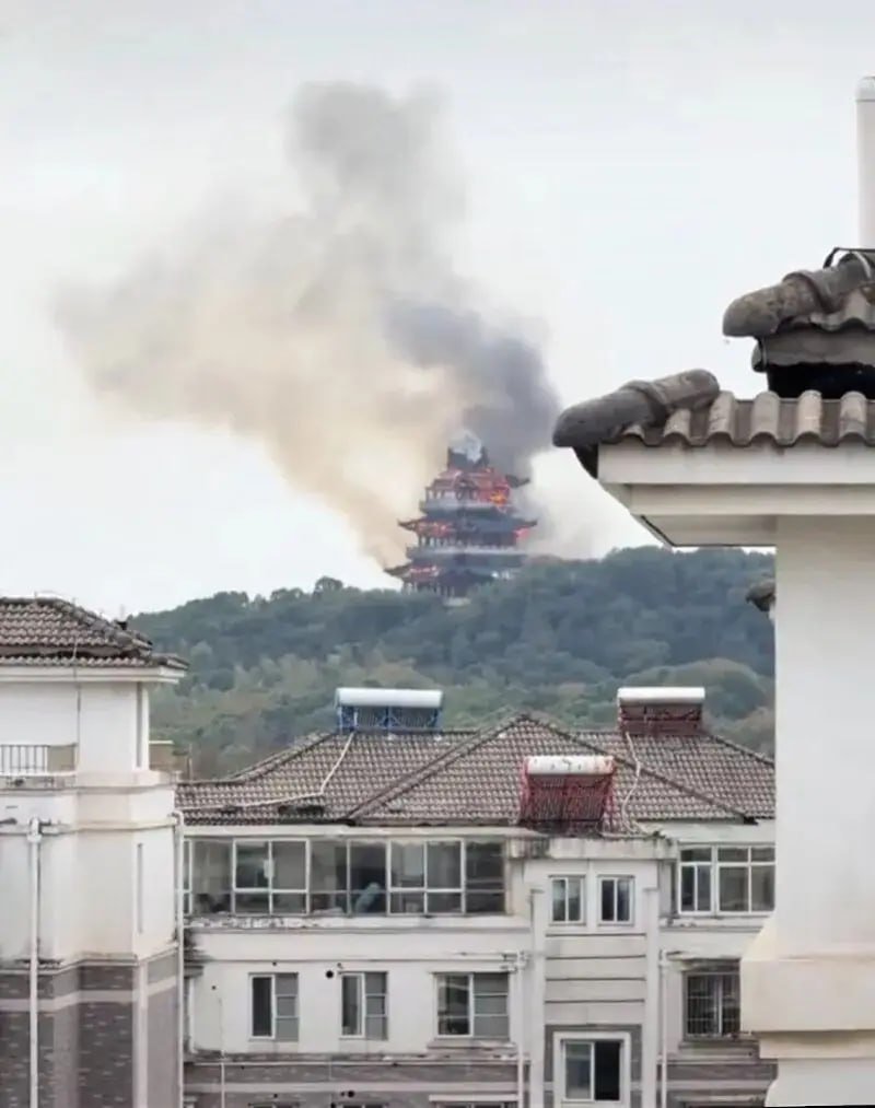 Tourist sets temple on fire.