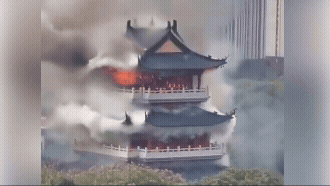 Tourist causes fire that burns down 1500-year-old temple.
