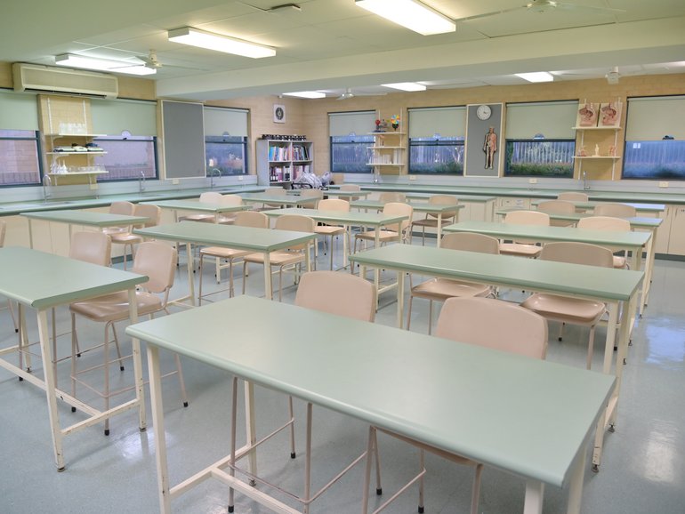 Three children were hospitalised after they were poisoned with a chemical from their school’s science lab.