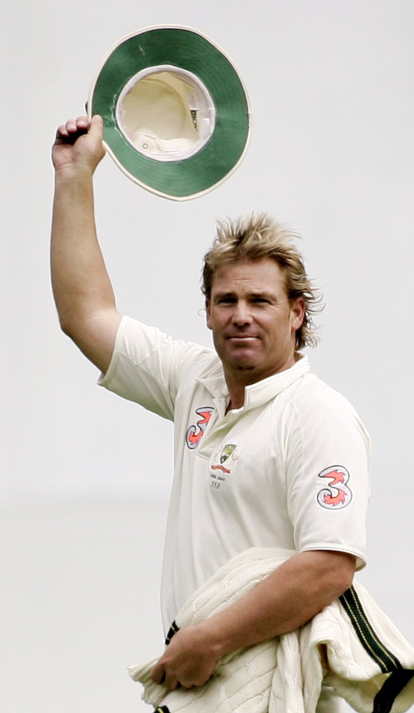 Australia's Shane Warne saluting the crowd after taking his 700th wicket during the 2006 Boxing Day Test.