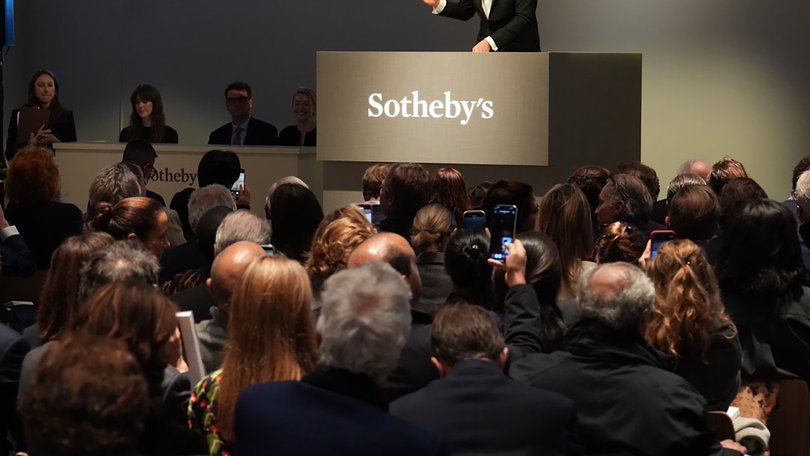 Oliver Barker, an auctioneer at Sotheby’s, hammers down a final bid on a portrait of Elisabeth Lederer by Klimt, in New York.