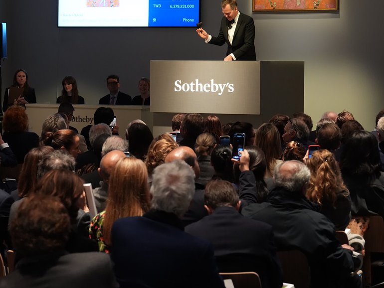 Oliver Barker, an auctioneer at Sotheby’s, hammers down a final bid on a portrait of Elisabeth Lederer by Klimt, in New York.