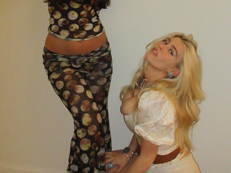 Clementine Vaughn poses suggestively with friends.