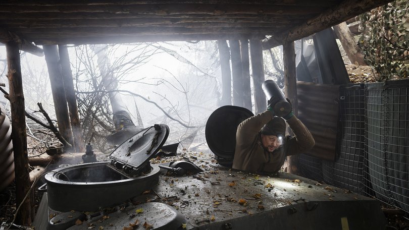 A member of the Ukrainian artillery unit fires a howitzer at Russian targets in the Dnipropetrovsk region of Ukraine in October.