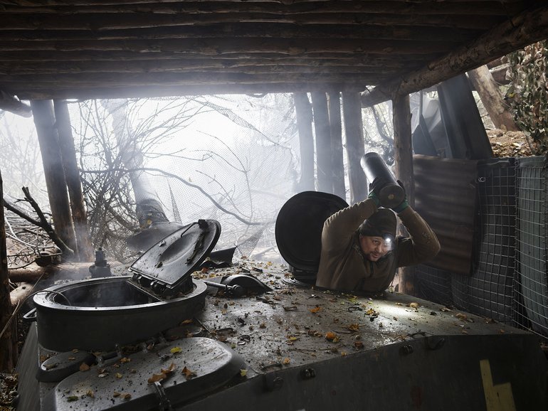 A member of the Ukrainian artillery unit fires a howitzer at Russian targets in the Dnipropetrovsk region of Ukraine in October.