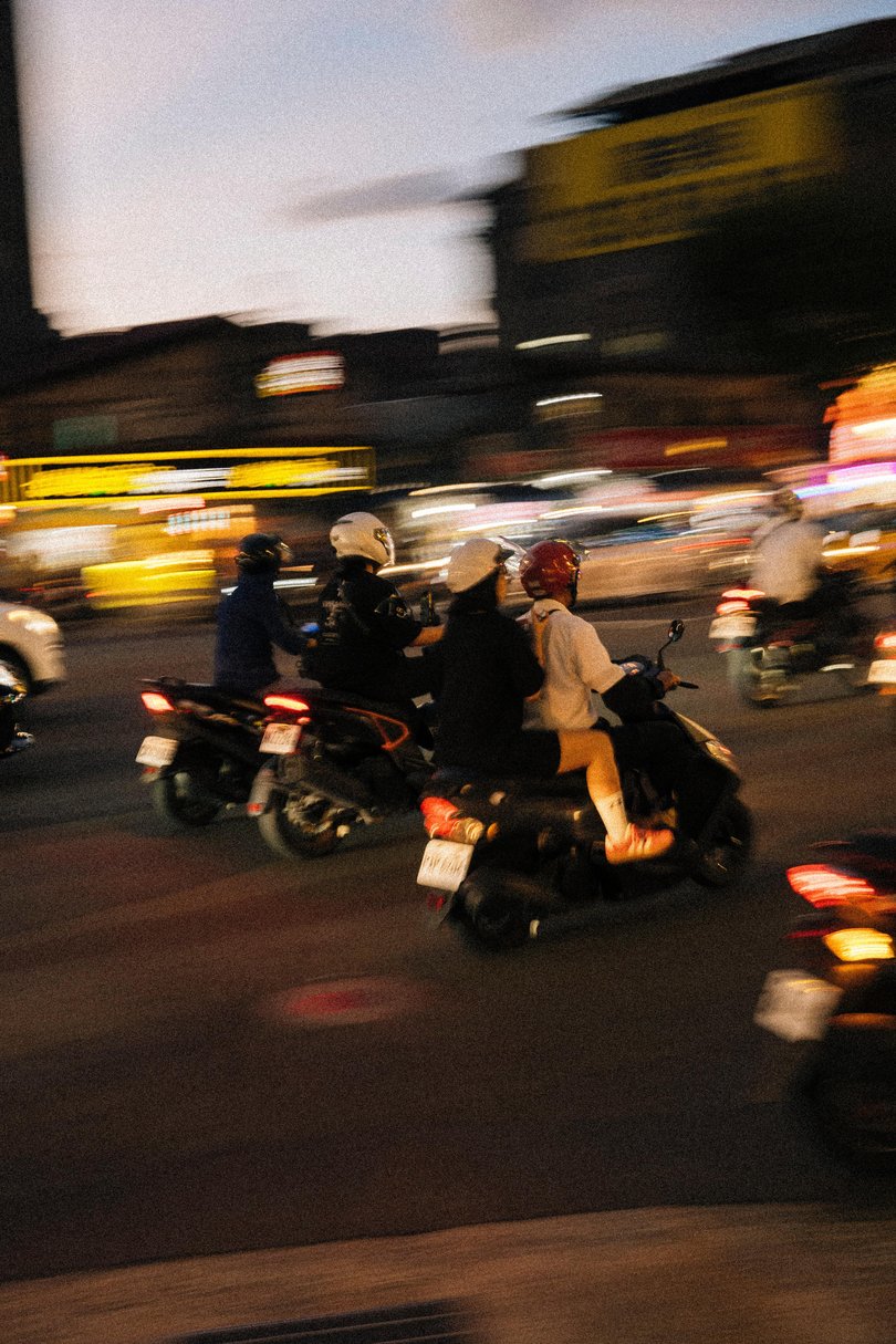 Twilight motorbike rides in Taipei.
