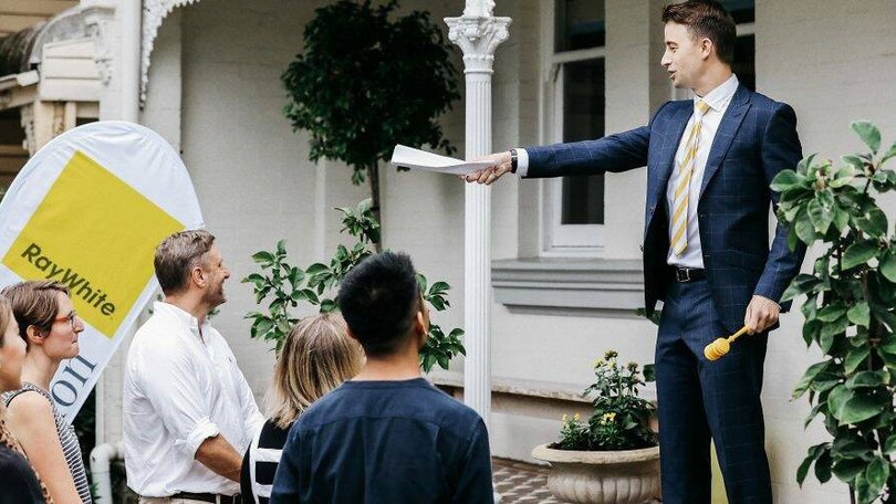 Ray White auctioneer in action.