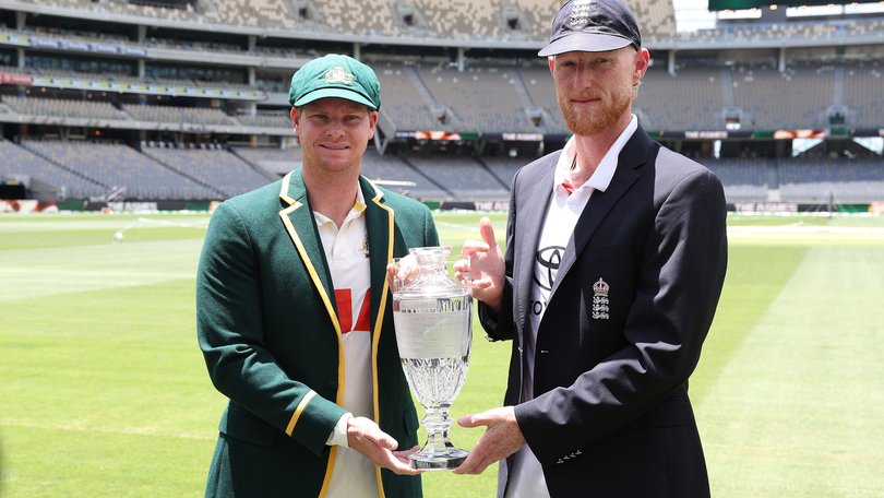 Australian cricket team captain Steve Smith and England cricket team captain Ben Stokes pose with the Ashes trophy ahead of the Ashes Test on the weekend