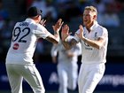 England captain Ben Stokes celebrates with Brydon Carse after dismissing Travis Head.