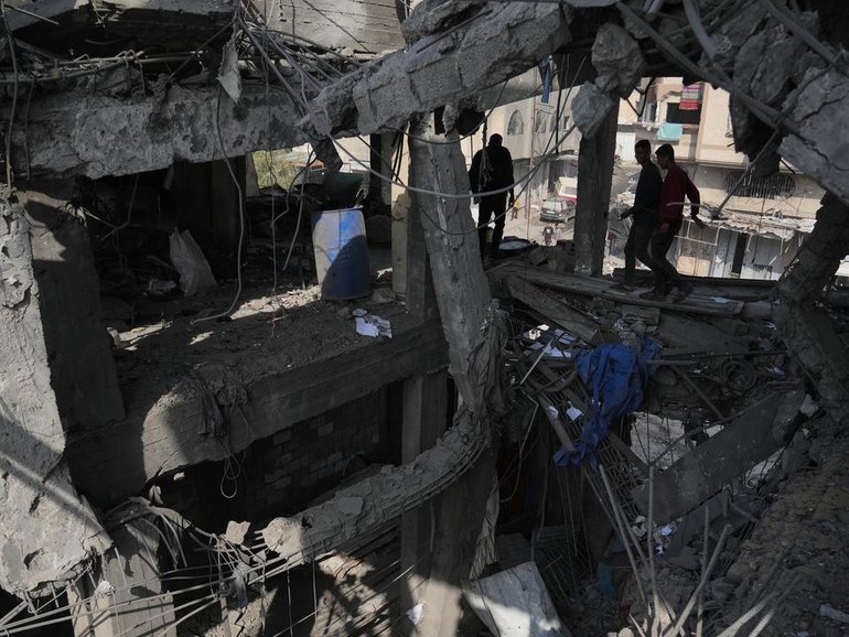 At least 10 people were killed in a building in Gaza City that was struck by Israeli forces. (AP PHOTO)
