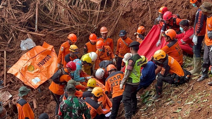 Hundreds of rescuers continue to look for the missing after a landslide in Central Java.